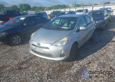 2014 Toyota Prius C One z USA, uszkodzony, nr VIN JTDKDTB31E1563677